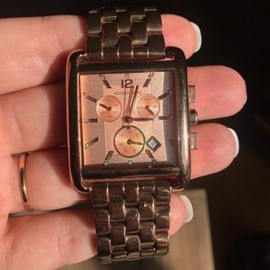Michael Kors rose gold watch.